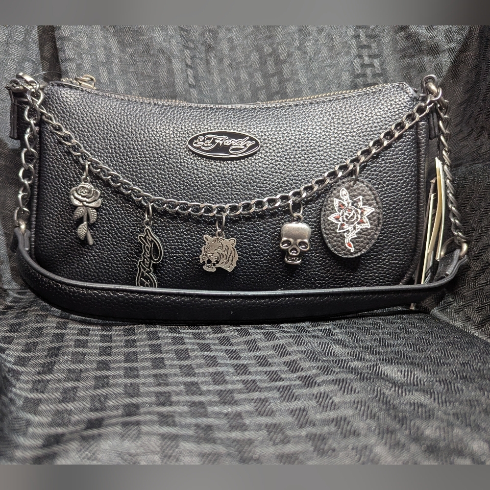 Black Ed Hardy Leather Baguette Shoulder Bag with Charm Chain and Skull Accents.